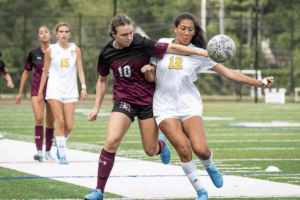 Ingrid Murphy battles for possession against Eastchester on Sept. 20. Murphy had all three goals in Harrison's 3-0 win.